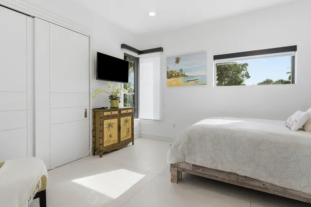 a view of a kitchen with wooden floor and sliding glass door