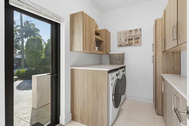 a view of a swimming pool with outdoor seating