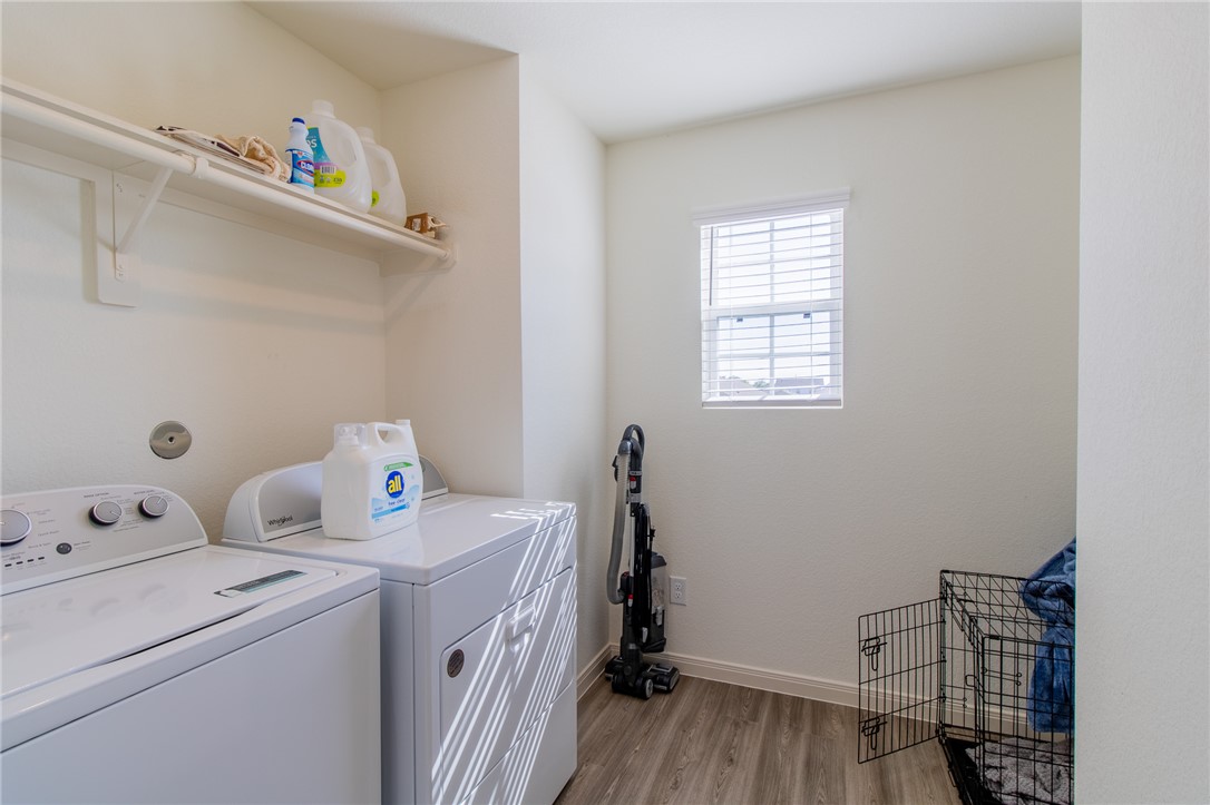 6029 Toby Bend Bryan, TX 77807 - Photo 13 of 25 a view of utility room with washer and dryer