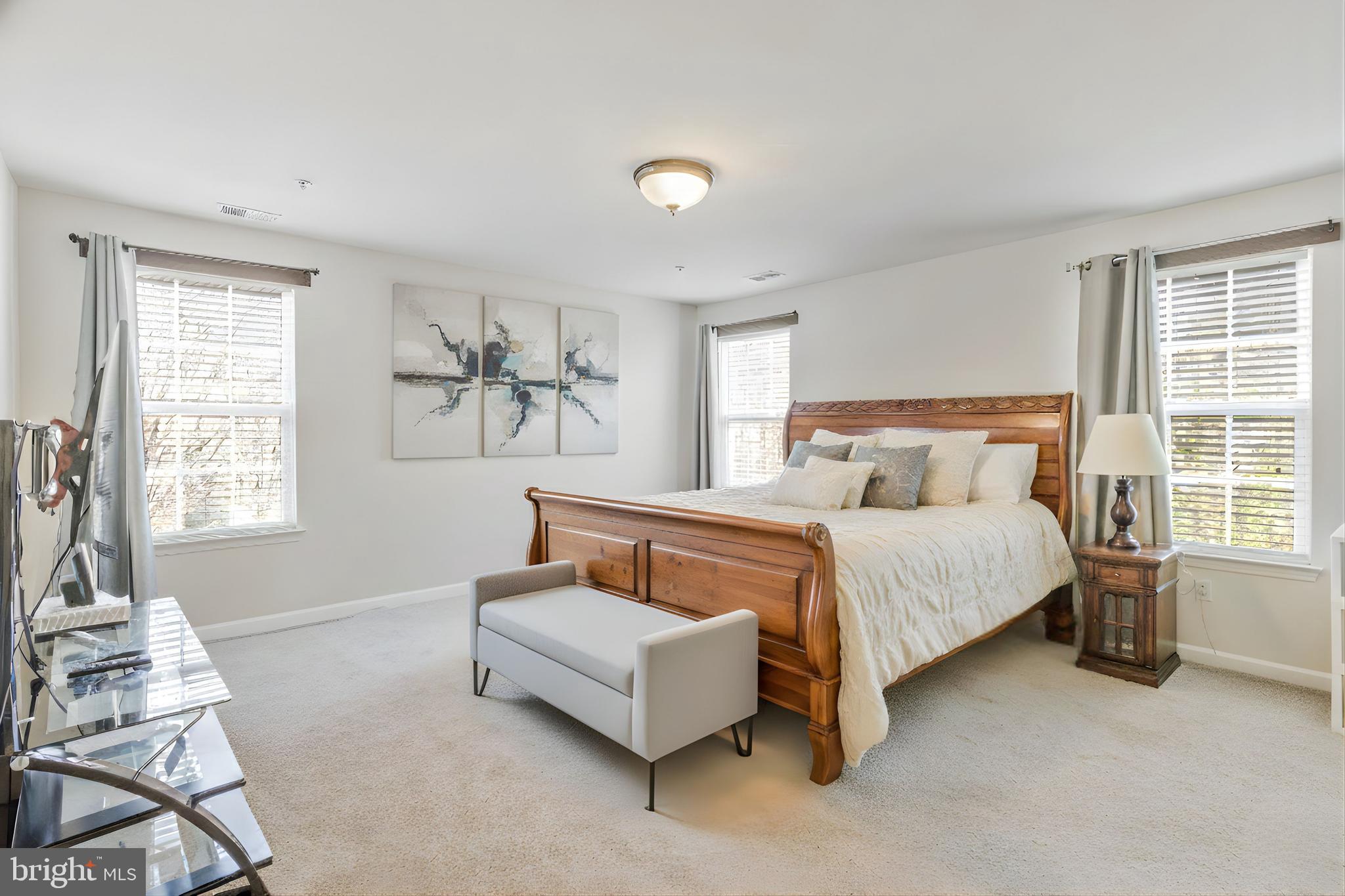 4615 Cimmaron Greenfields Drive Bowie, MD 20720 - Photo 13 of 27 a bedroom with a bed and a window