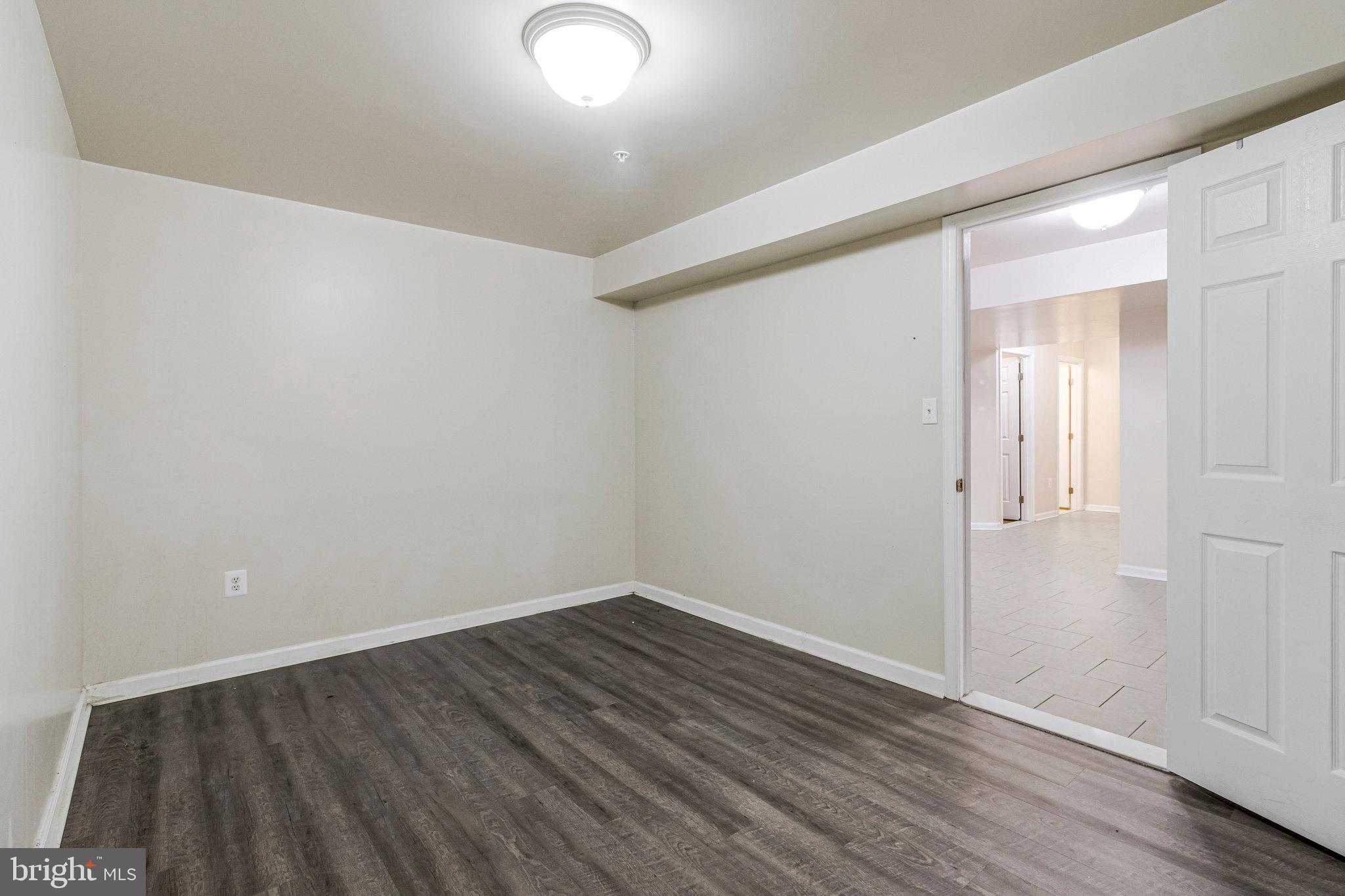 4615 Cimmaron Greenfields Drive Bowie, MD 20720 - Photo 24 of 27 wooden floor in an empty room