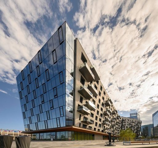 a room with gym equipment and a mirror
