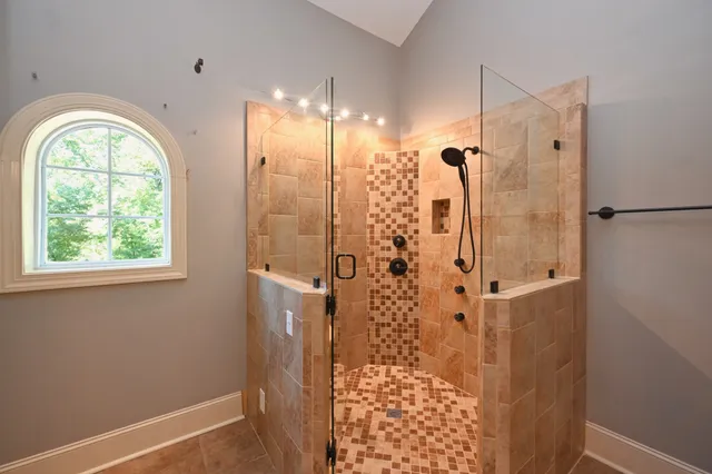 a view of a hallway with a large window