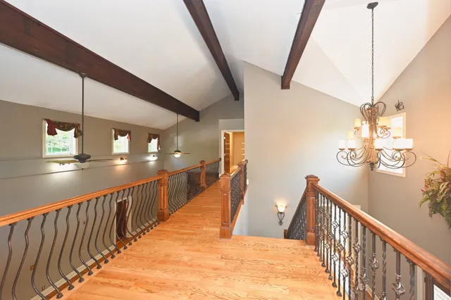 a bathroom with a bathtub and a toilet