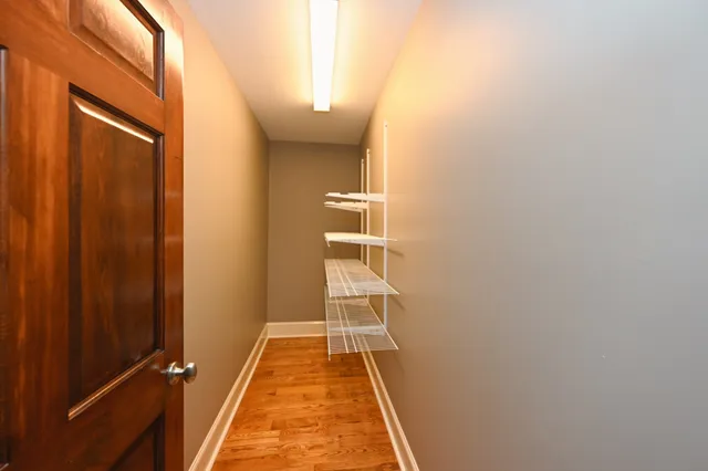 a kitchen with stainless steel appliances granite countertop a stove microwave and cabinets