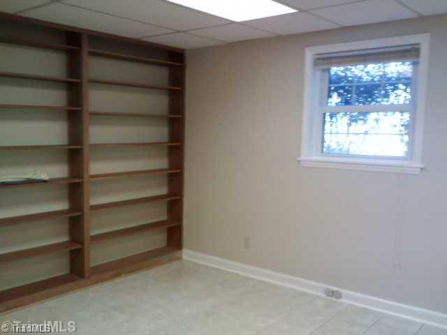 1105 Rogers Road Mount Airy, NC 27030 - Photo 7 of 8 Exterior Front. OFFICE ON LOWER LEVEL WITH BUILT IN SHELVES