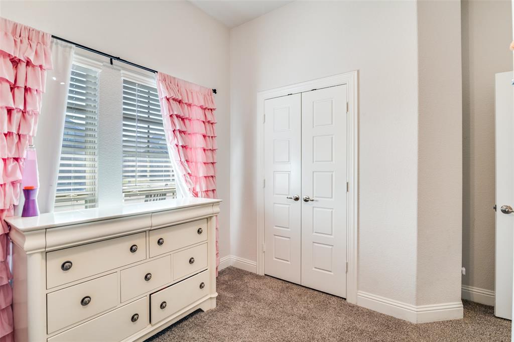 537 Declaration Way Fate, TX 75189 - Photo 21 of 39 a view of cabinets and window