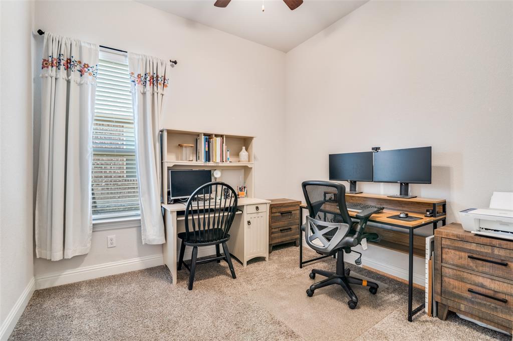 537 Declaration Way Fate, TX 75189 - Photo 28 of 39 a view of a workspace with furniture and a window
