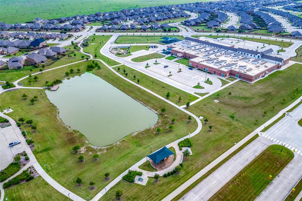 537 Declaration Way Fate, TX 75189 - Photo 39 of 39 an aerial view of a pool and an outdoor space