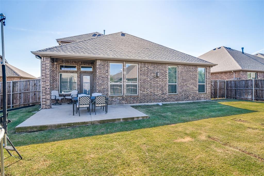 537 Declaration Way Fate, TX 75189 - Photo 5 of 39 a view of a house with a yard and sitting area