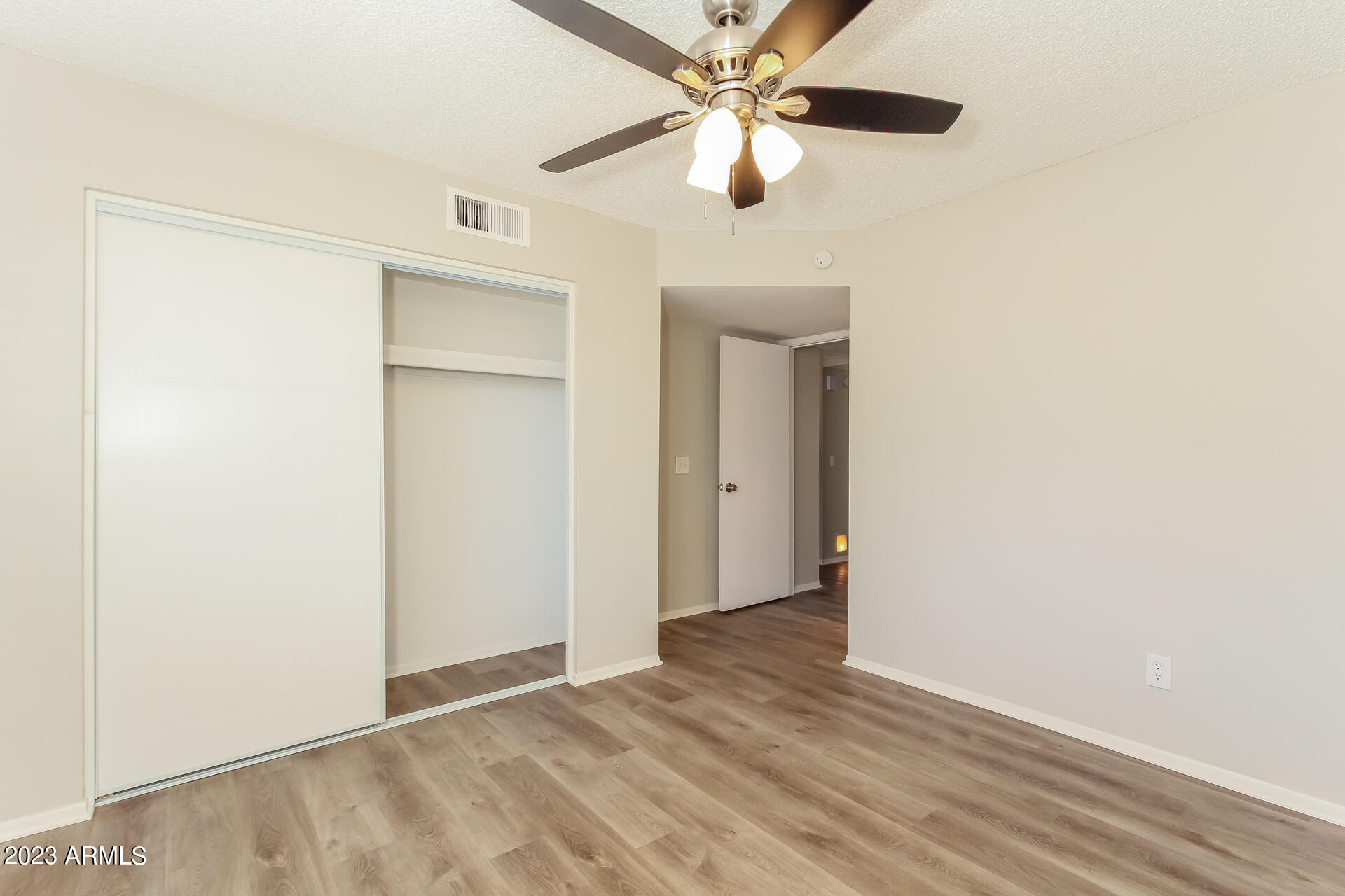 6127 West Nancy Road Glendale, AZ 85306 - Photo 7 of 16 007-photo-primary-bedroom-11063630