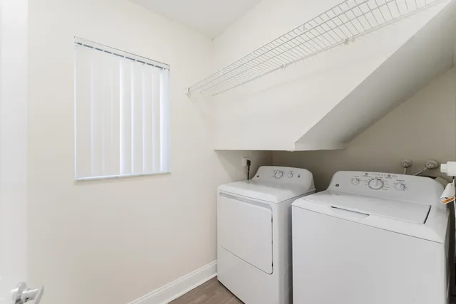 a utility room with dryer and washer