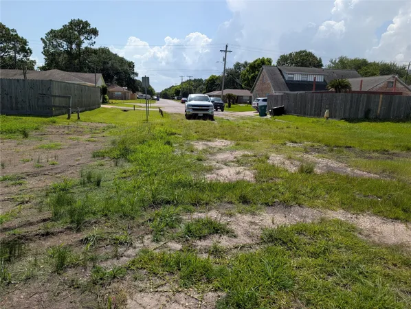 a view of a backyard with couches