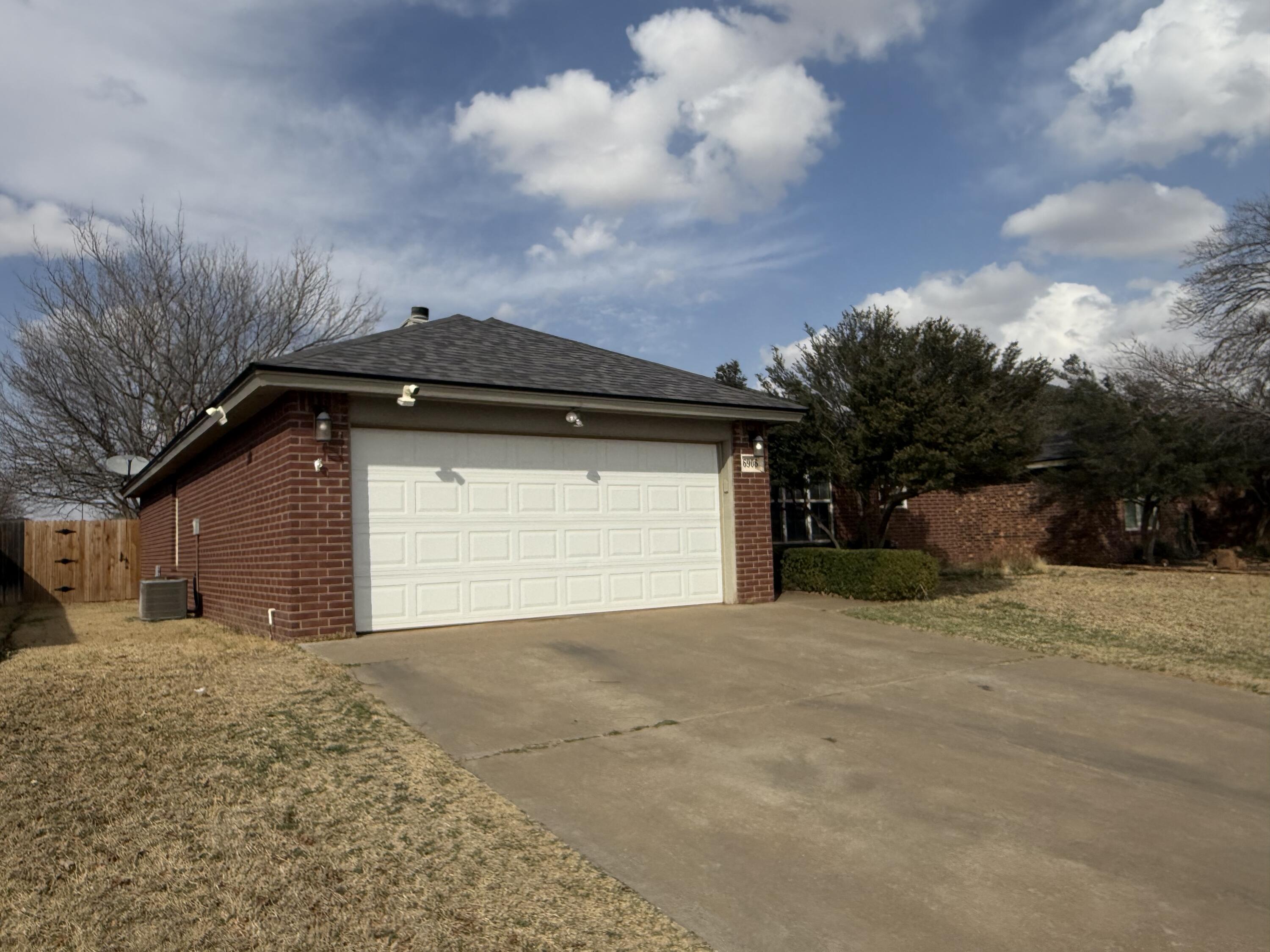 6906 8th Street Lubbock, TX 79416 - Photo 2 of 42 a view of the house with a outdoor space