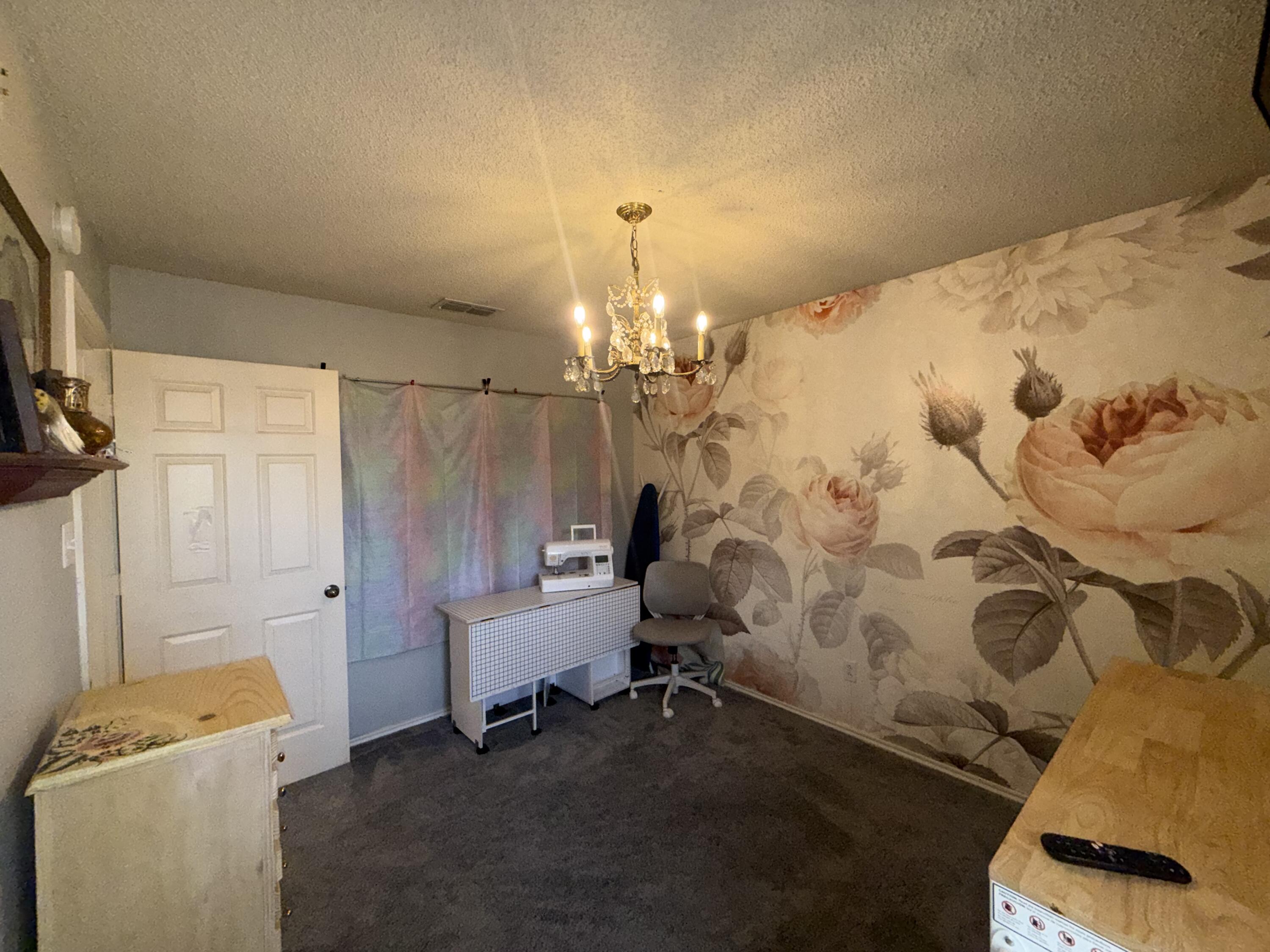 6906 8th Street Lubbock, TX 79416 - Photo 32 of 42 a bedroom with a bed and a window