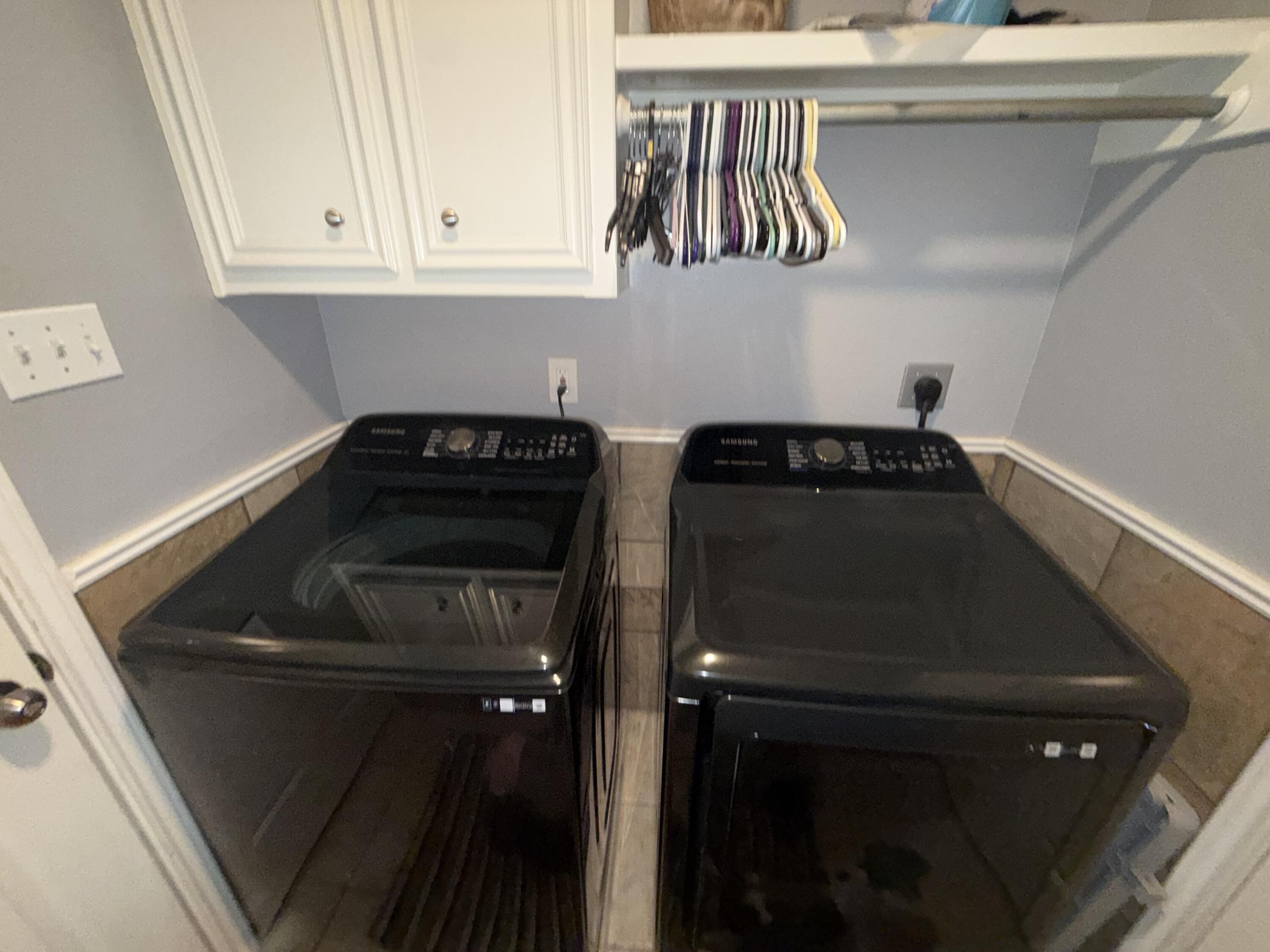 6906 8th Street Lubbock, TX 79416 - Photo 35 of 42 a kitchen with a stove and a microwave