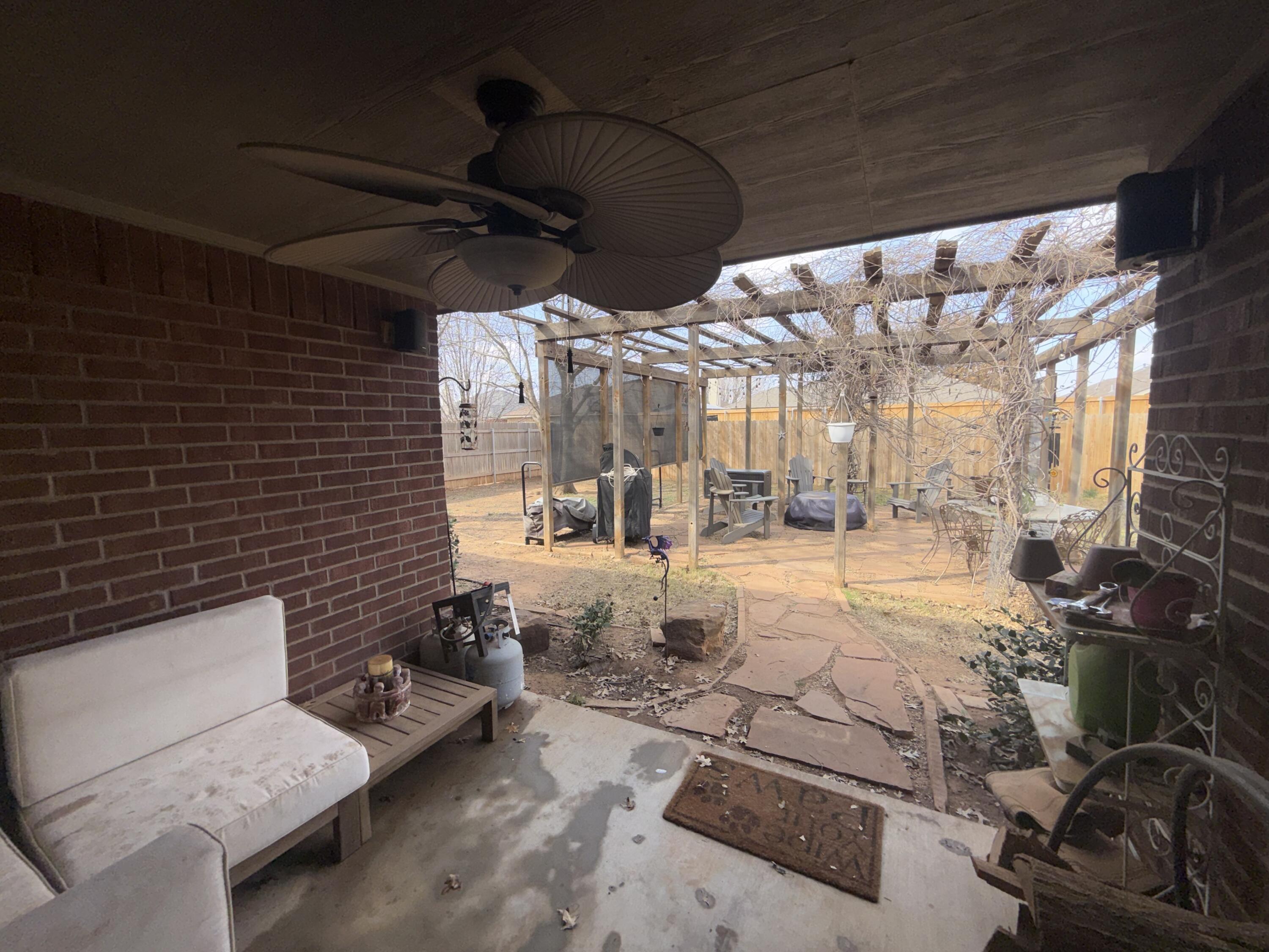 6906 8th Street Lubbock, TX 79416 - Photo 39 of 42 a building outdoor space with patio furniture