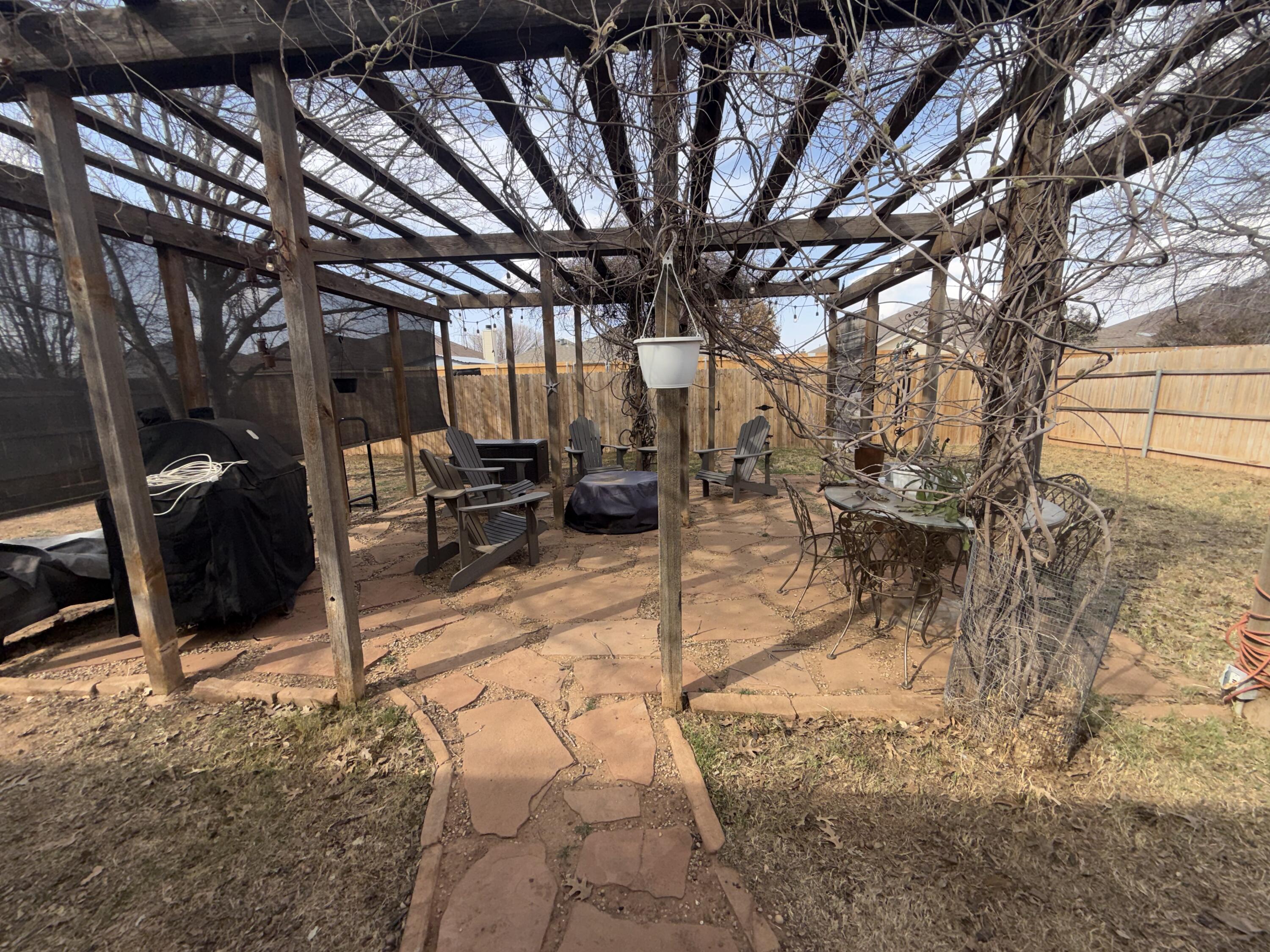 6906 8th Street Lubbock, TX 79416 - Photo 40 of 42 a view of outdoor space with seating area