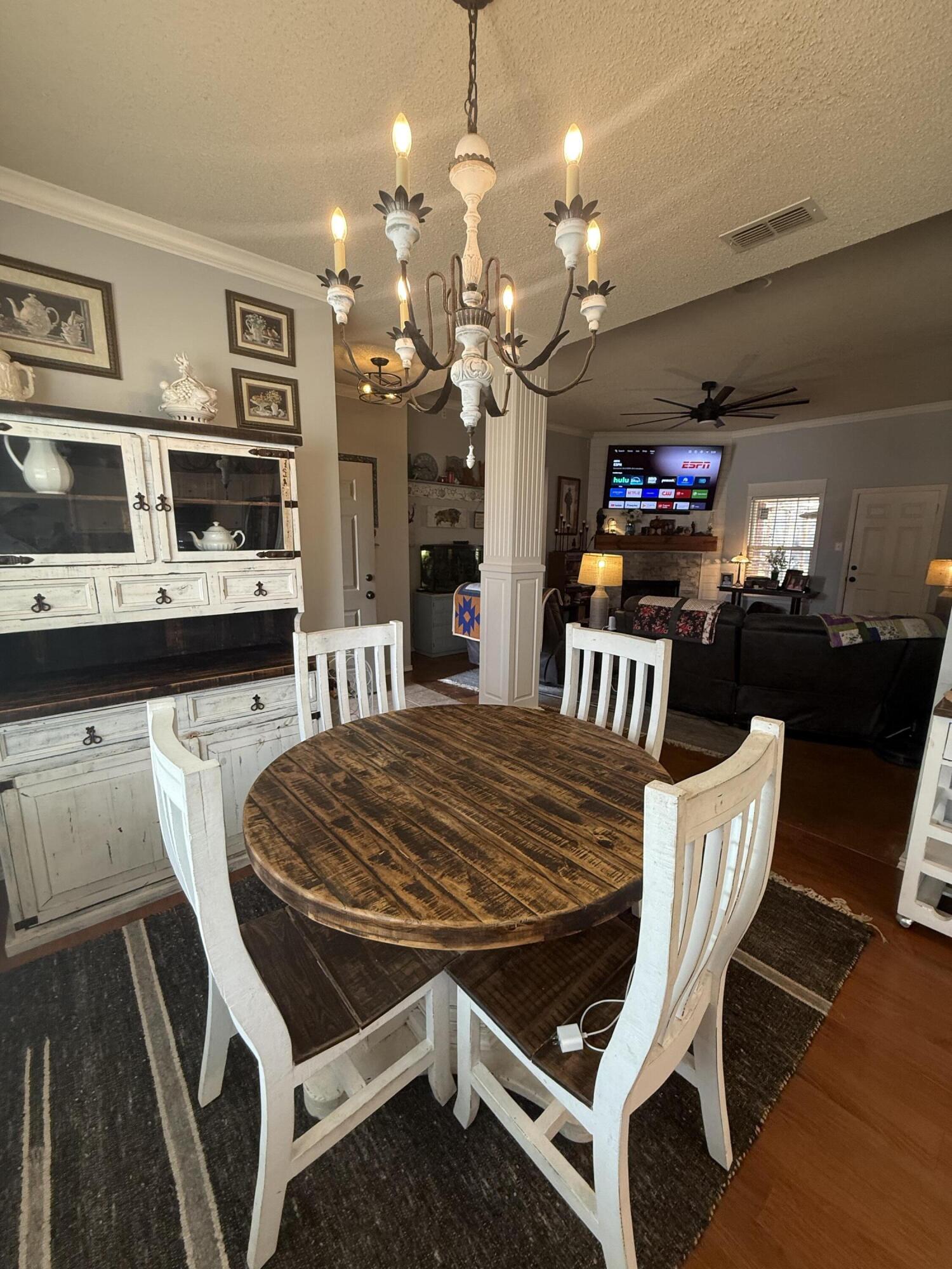 6906 8th Street Lubbock, TX 79416 - Photo 10 of 42 a view of a dining room with furniture