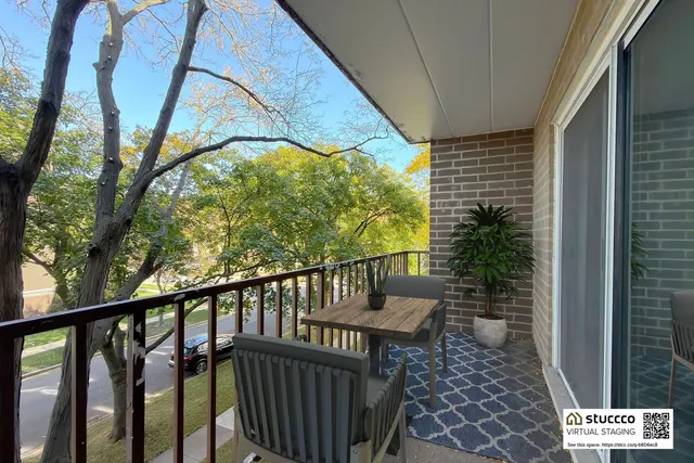 a view of balcony with furniture
