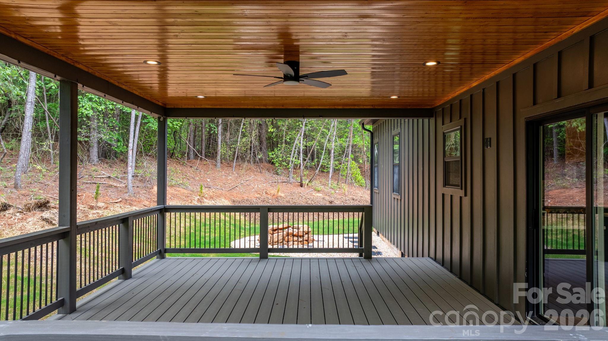 6265 Riviera Run Estates Drive Hickory, NC 28601 - Photo 32 of 44 a view of a porch with wooden floor and outdoor seating