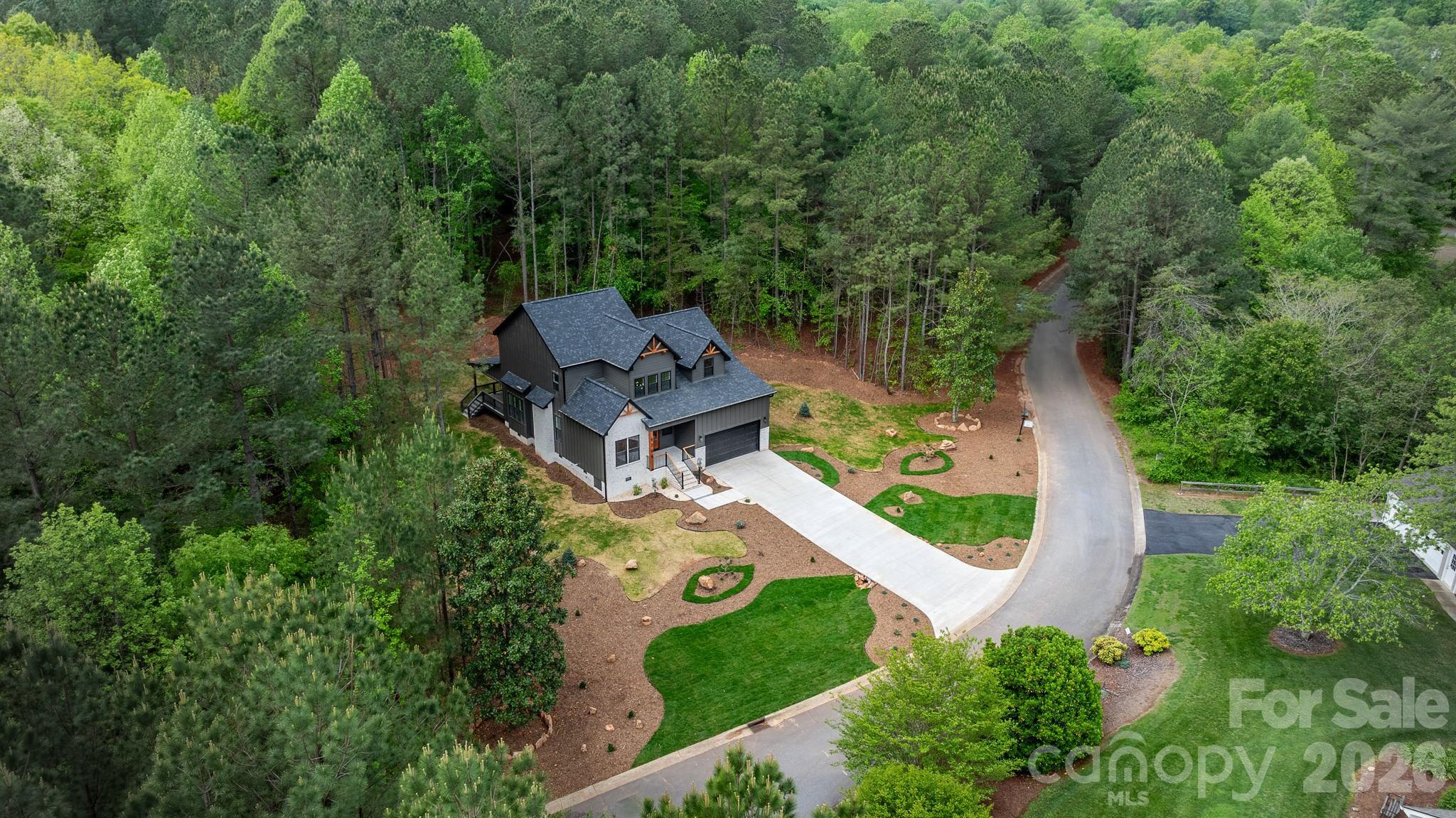6265 Riviera Run Estates Drive Hickory, NC 28601 - Photo 36 of 44 an aerial view of a house with a yard