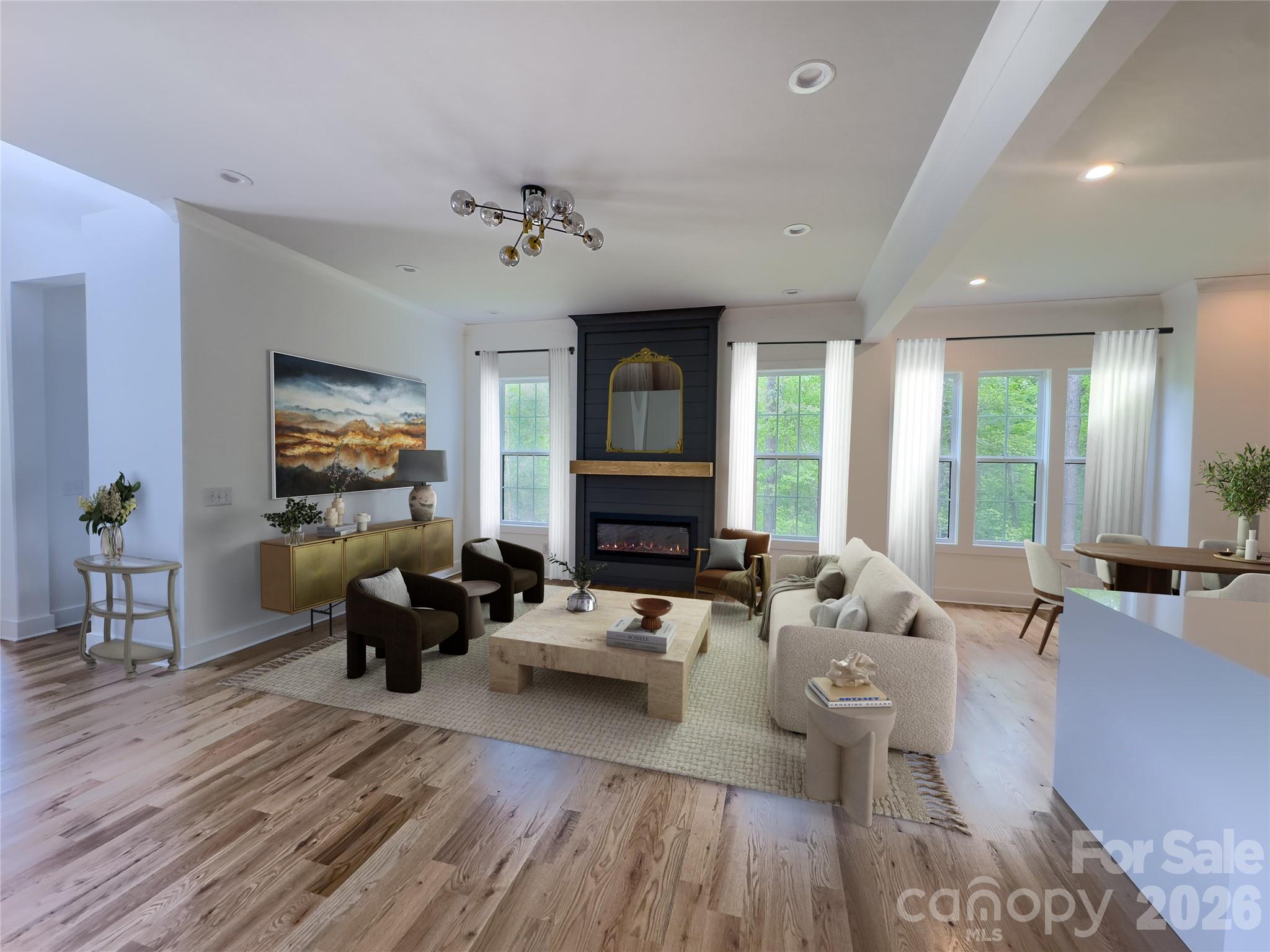 6265 Riviera Run Estates Drive Hickory, NC 28601 - Photo 7 of 44 a living room with fireplace furniture and a wooden floor
