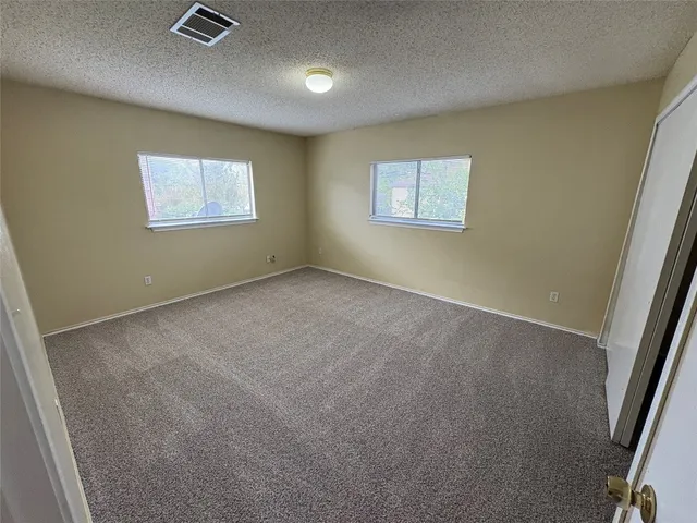 a view of a balcony with a swing