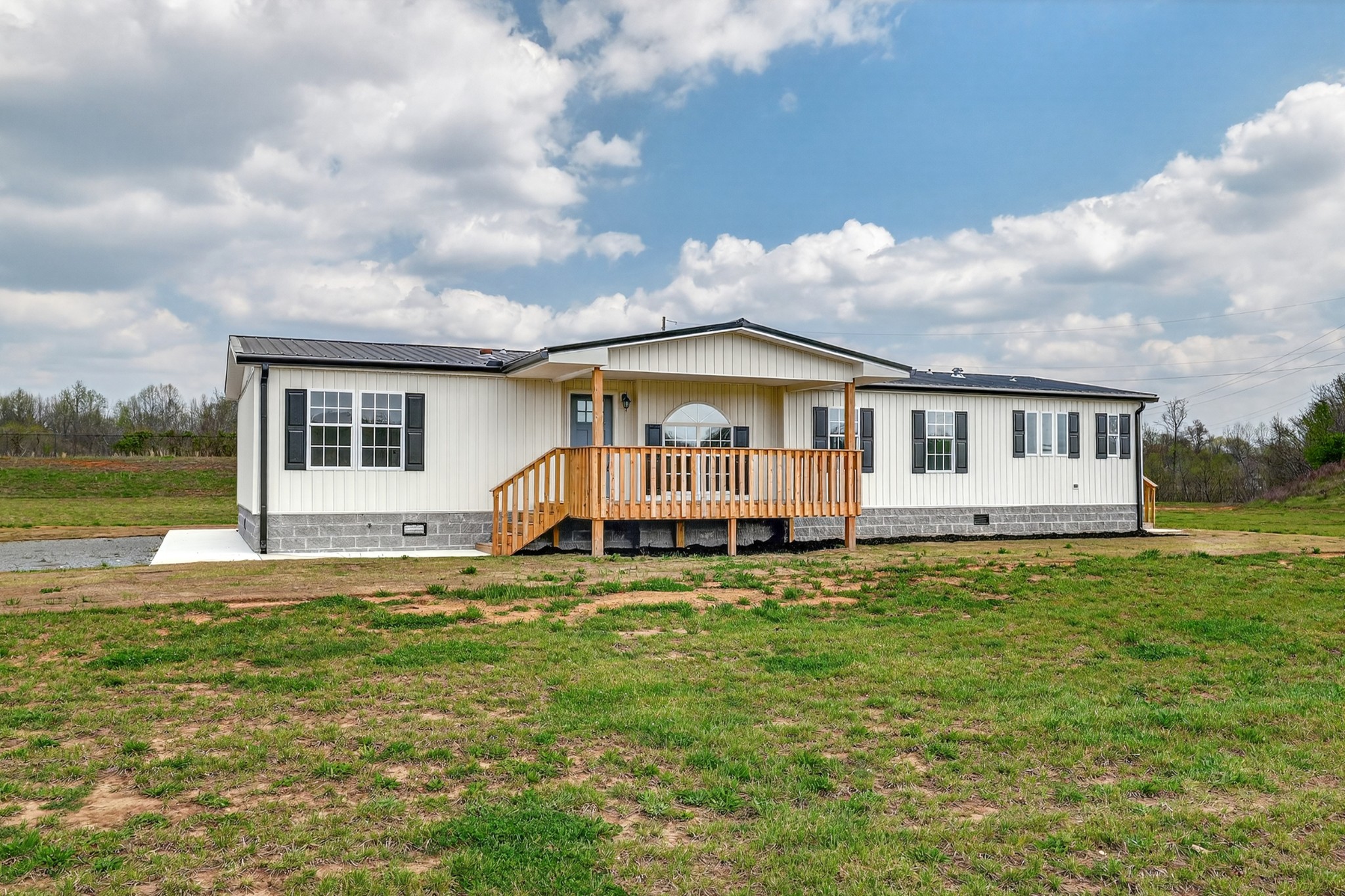 560 Old Huntsville Road Fayetteville, TN 37334 - Photo 2 of 32 a view of house with a big yard and swimming pool