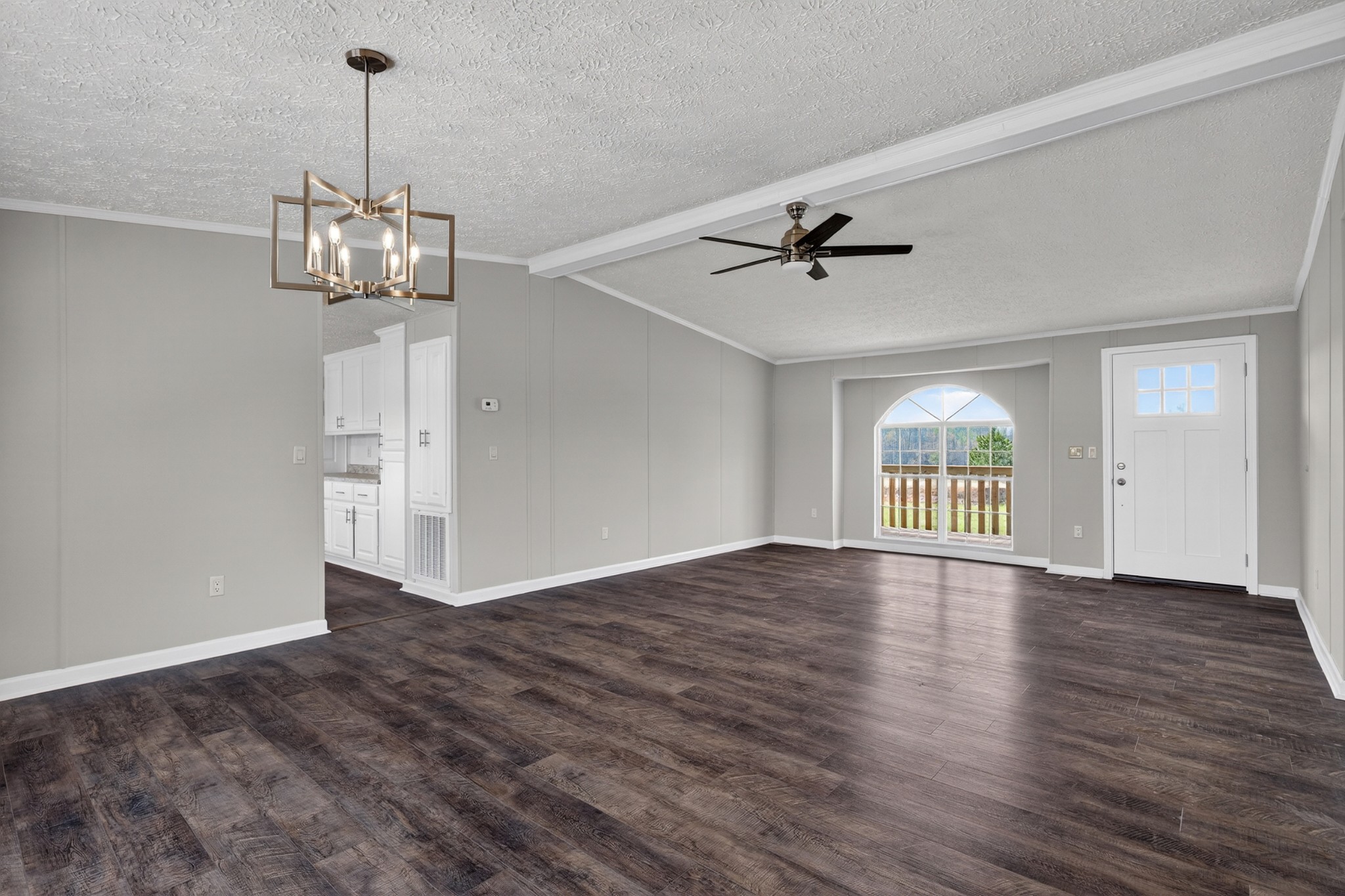560 Old Huntsville Road Fayetteville, TN 37334 - Photo 5 of 32 a view of an empty room with a window and wooden floor