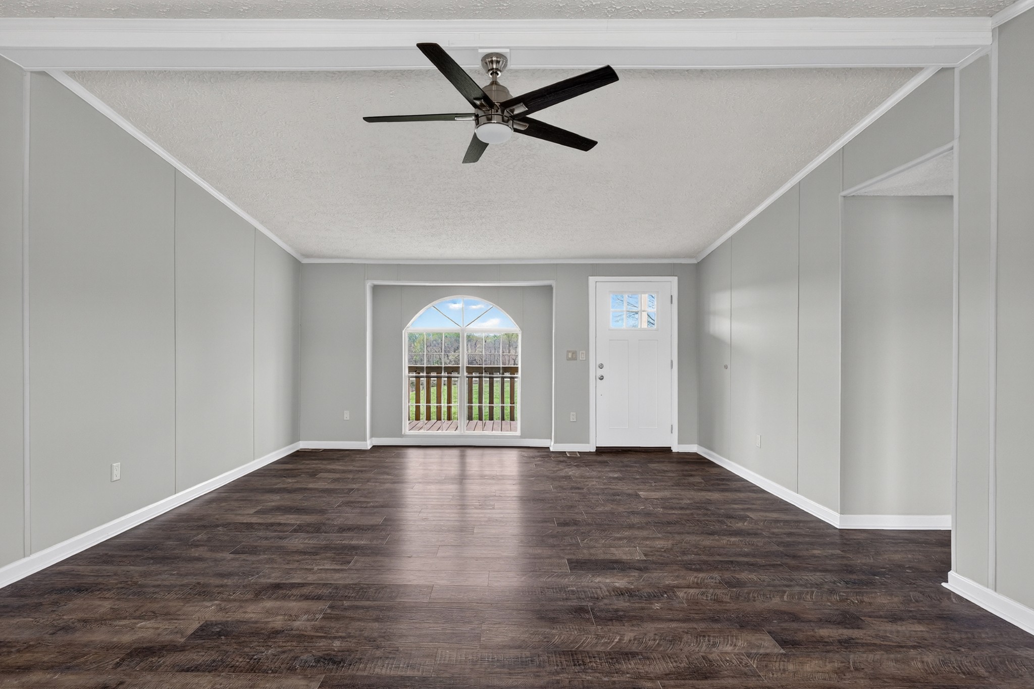 560 Old Huntsville Road Fayetteville, TN 37334 - Photo 6 of 32 a view of an empty room with a window and wooden floor