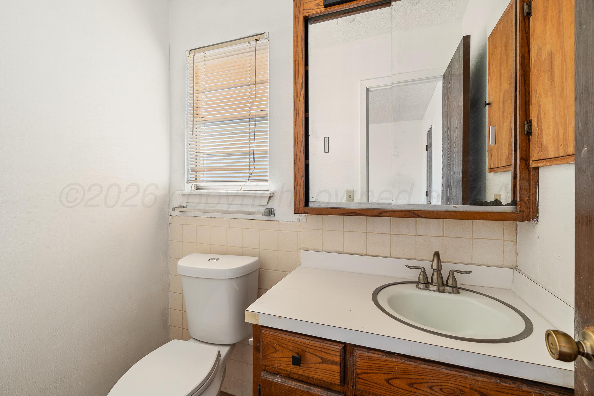 1815 Estes Street Amarillo, TX 79107 - Photo 12 of 15 Bathroom 2