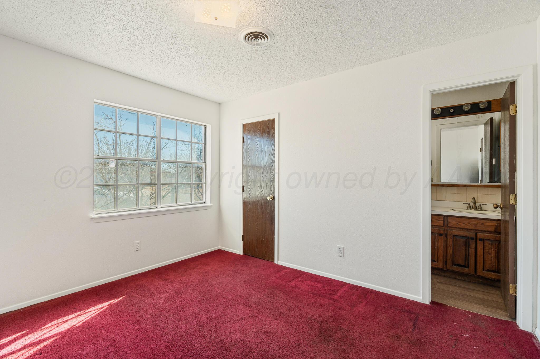 1815 Estes Street Amarillo, TX 79107 - Photo 8 of 15 Main Bedroom