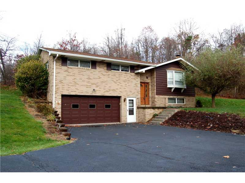 Exterior Front. Welcome to 2645 Butler Logan Road.    A lovely brick split level home on an exclusive acre of land in Deer Lakes School District.  Super convenient location - minutes from Rt 28 and Turnpike!!