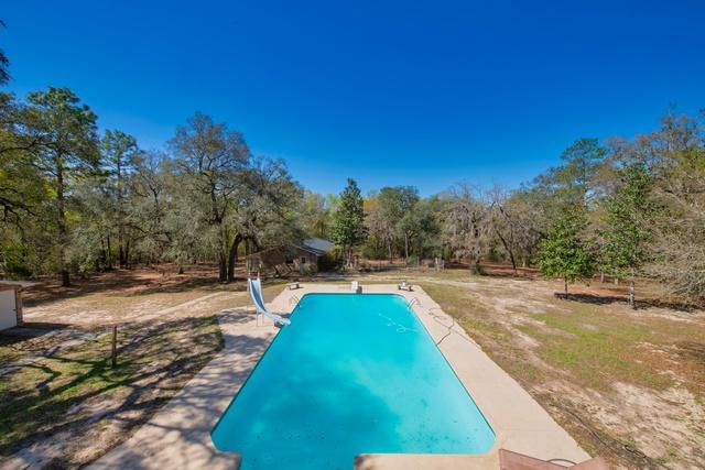 1 Lindley Road Crestview, FL 32536 - Photo 2 of 80 a view of swimming pool with lounge chair