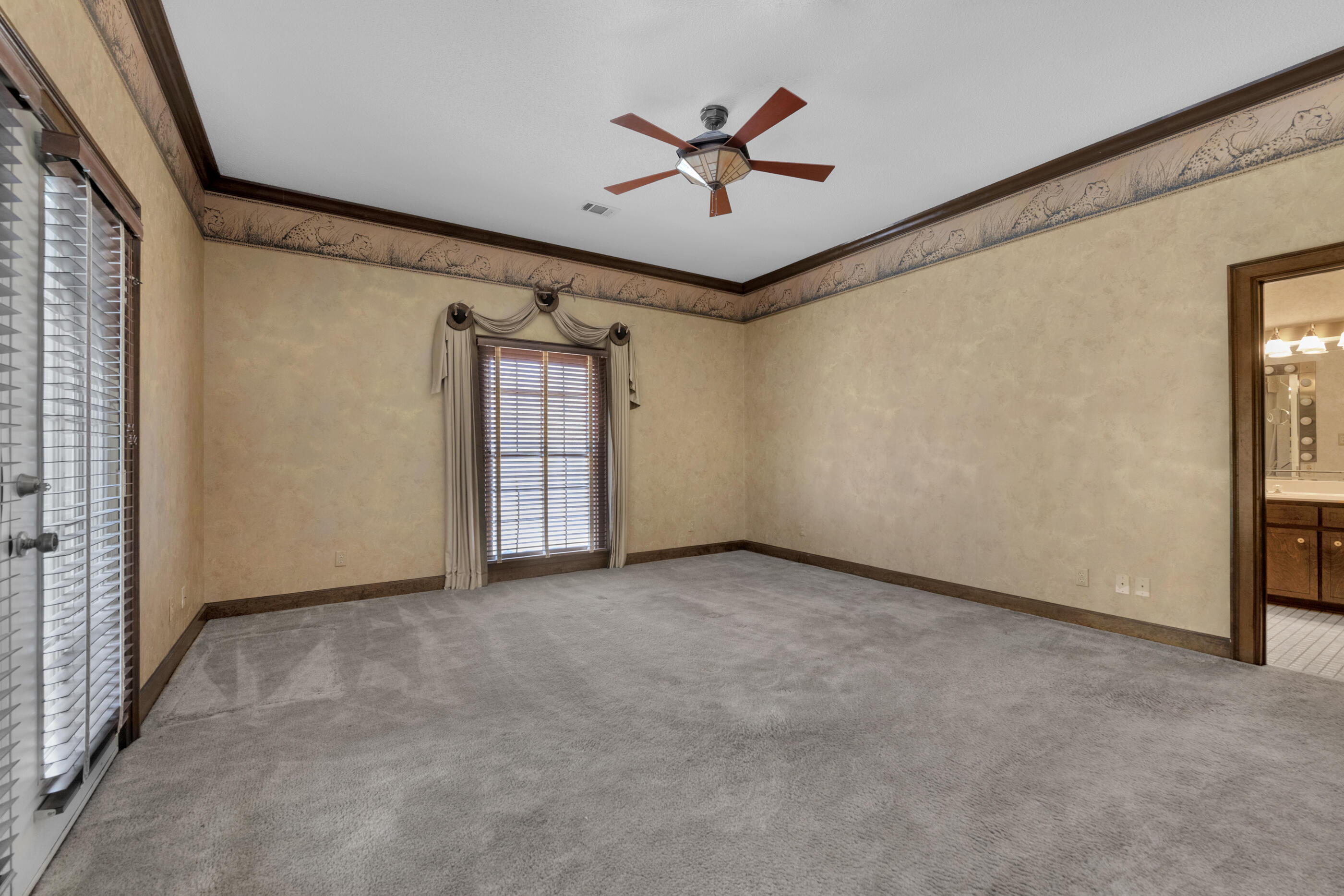 1 Lindley Road Crestview, FL 32536 - Photo 13 of 80 a view of a livingroom with a ceiling fan and window