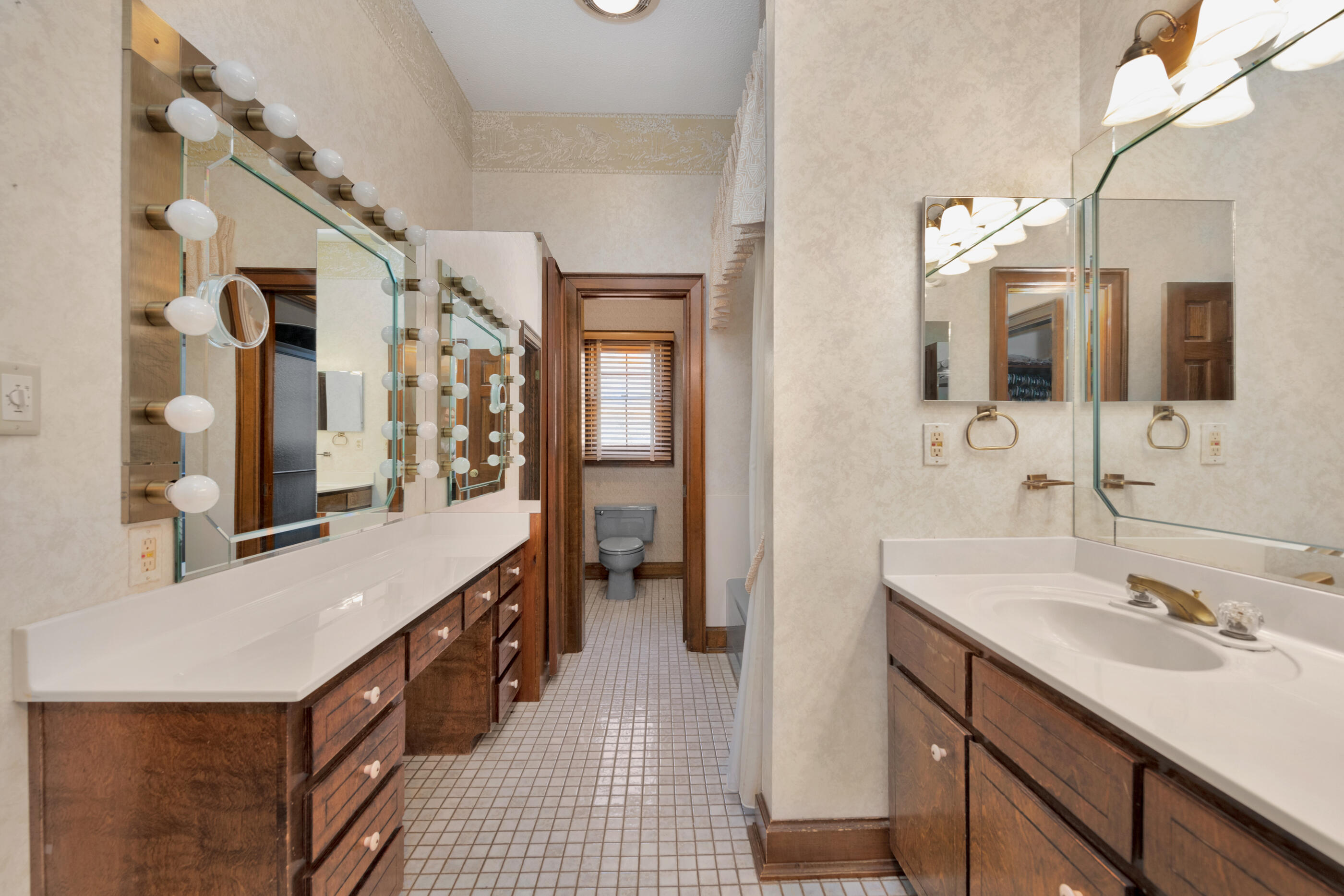 1 Lindley Road Crestview, FL 32536 - Photo 15 of 80 a spacious bathroom with a double vanity sink and a mirror