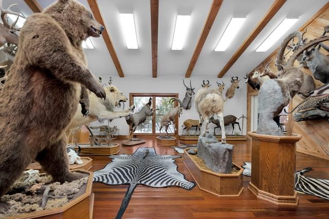 1 Lindley Road Crestview, FL 32536 - Photo 26 of 80 a room with lots of white furniture and a chandelier