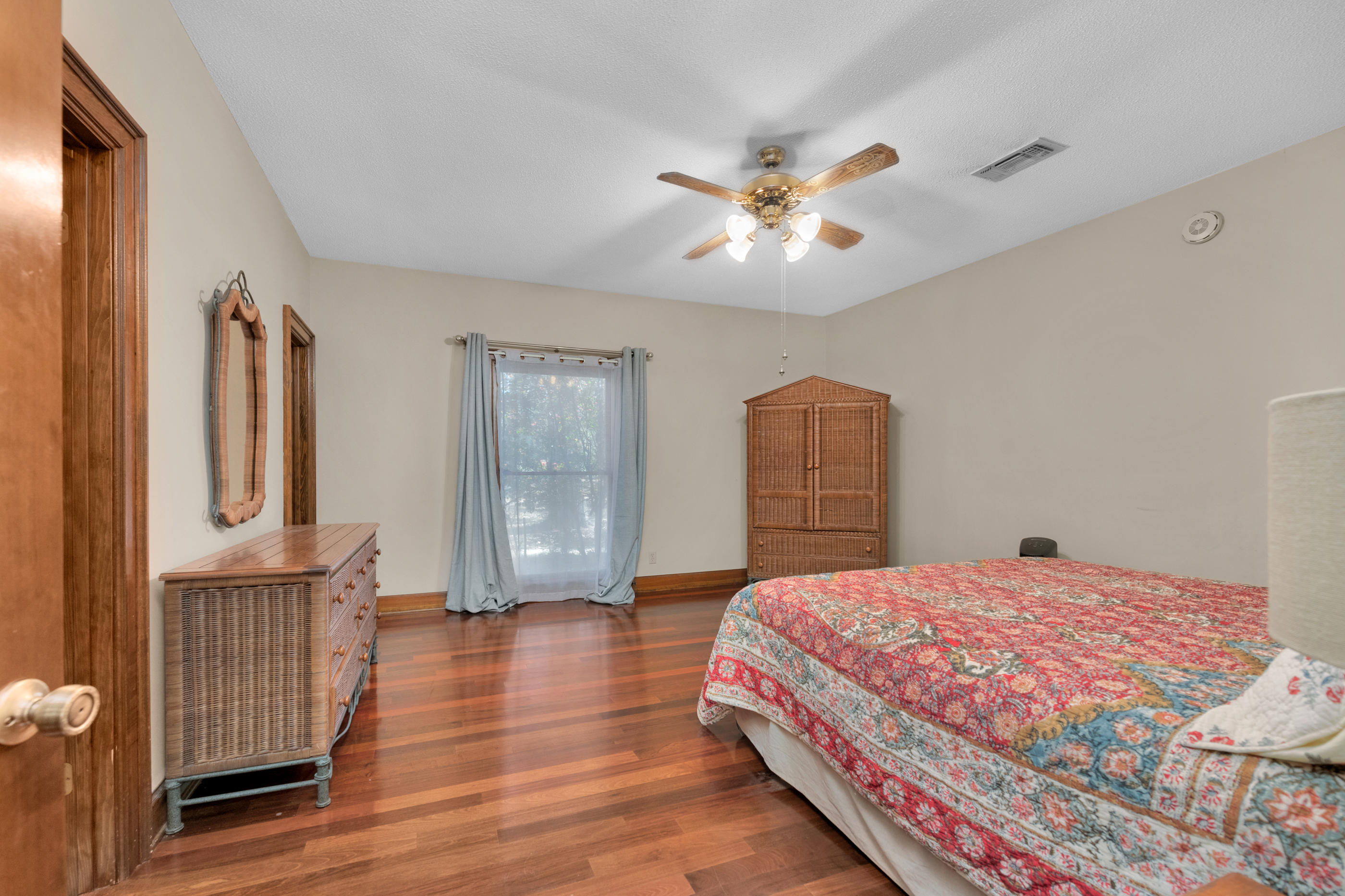 1 Lindley Road Crestview, FL 32536 - Photo 33 of 80 a bedroom with a bed and a chandelier