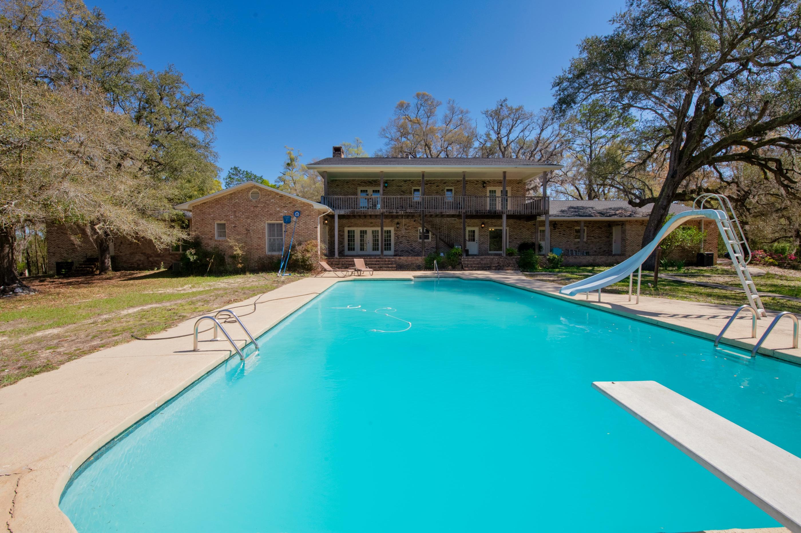 1 Lindley Road Crestview, FL 32536 - Photo 67 of 80 a view of a house with a swimming pool