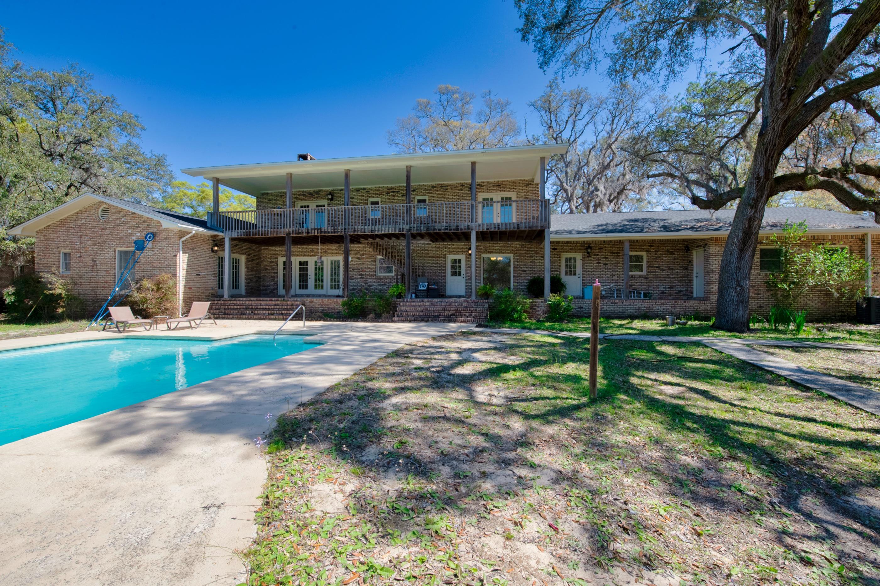 1 Lindley Road Crestview, FL 32536 - Photo 68 of 80 a view of a house with a yard and large tree