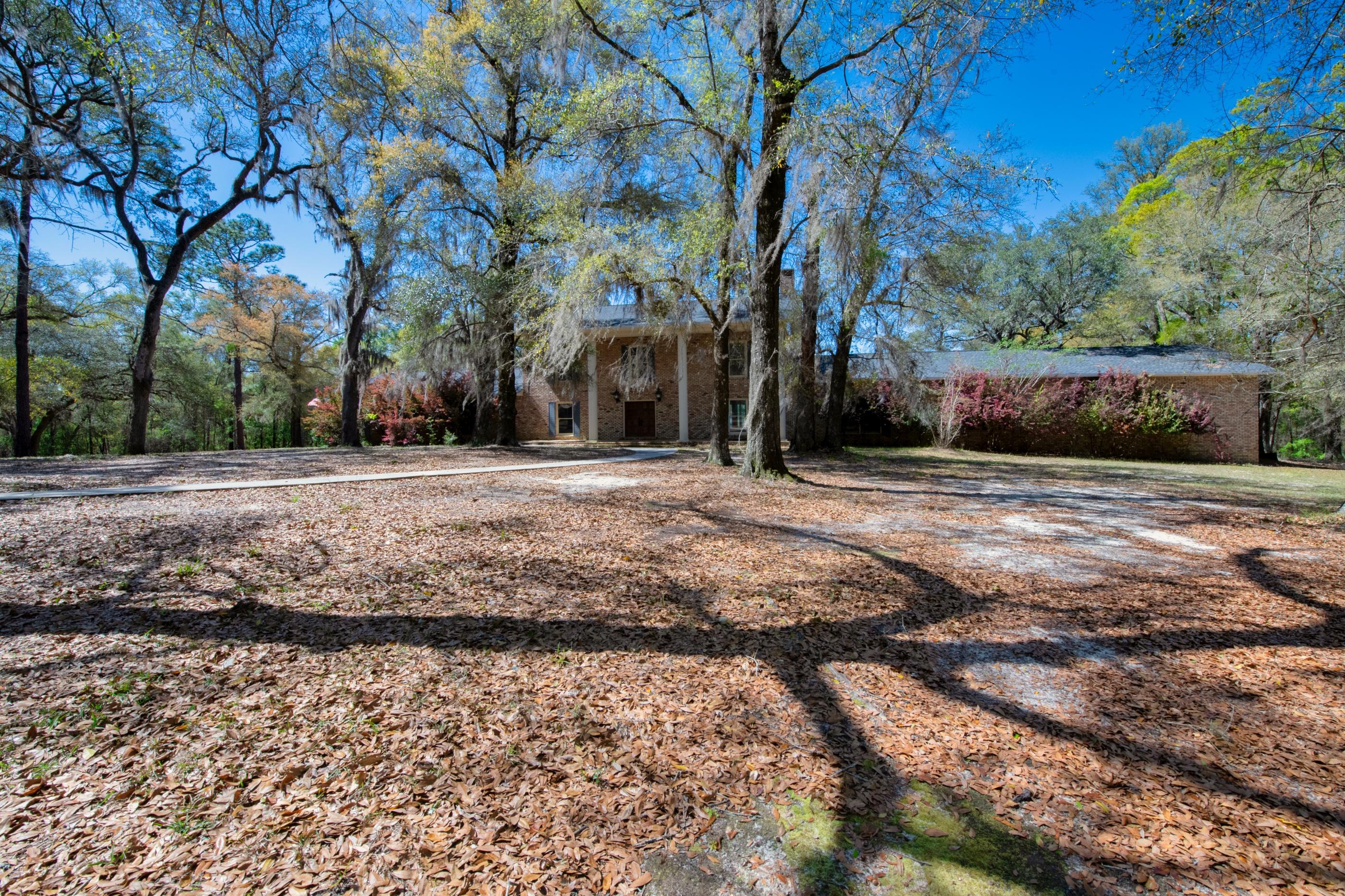 1 Lindley Road Crestview, FL 32536 - Photo 74 of 80 a view of a yard with a tree