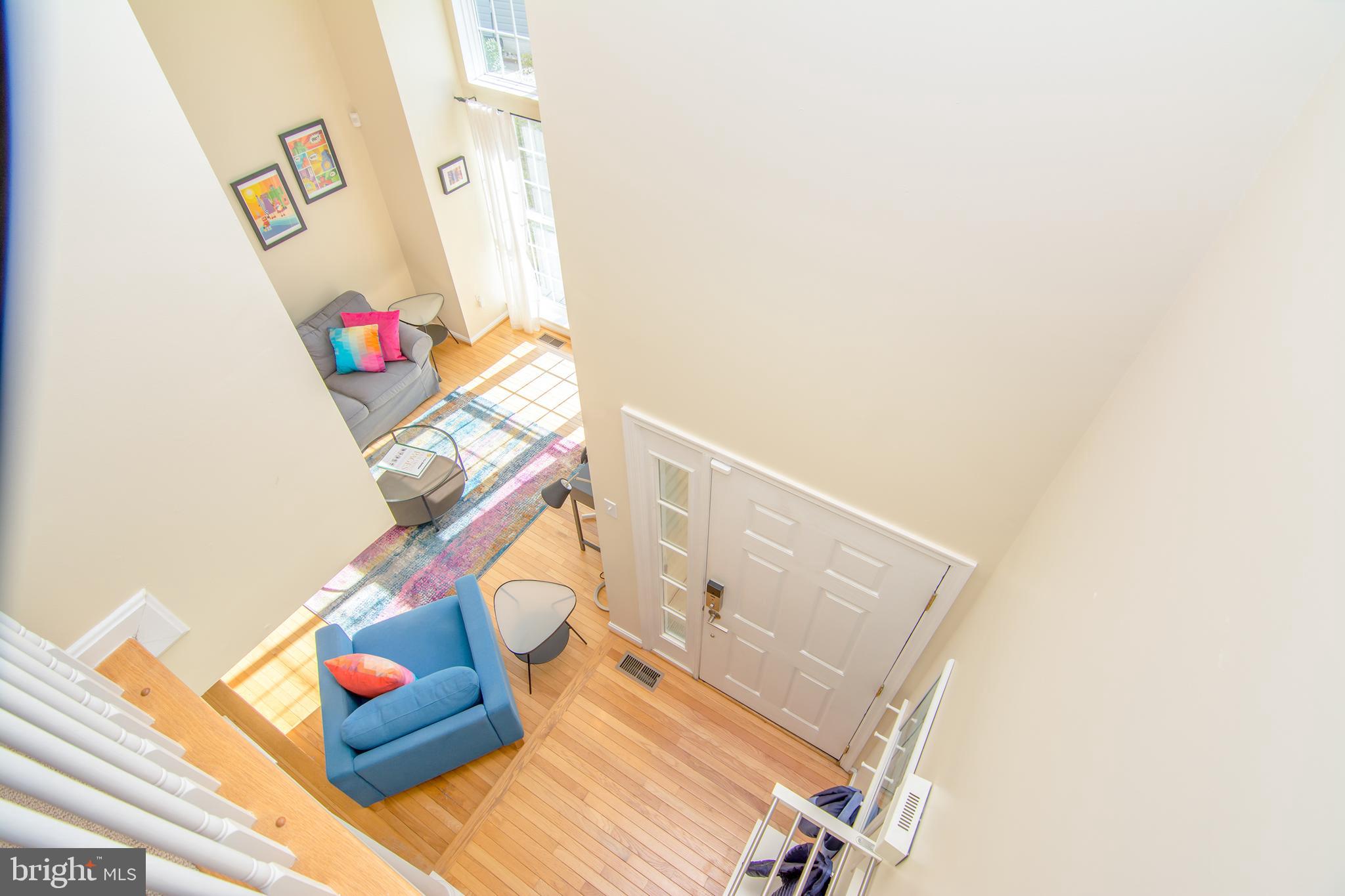 6477 Empty Song Road Columbia, MD 21044 - Photo 14 of 37 Two story entry and living room!