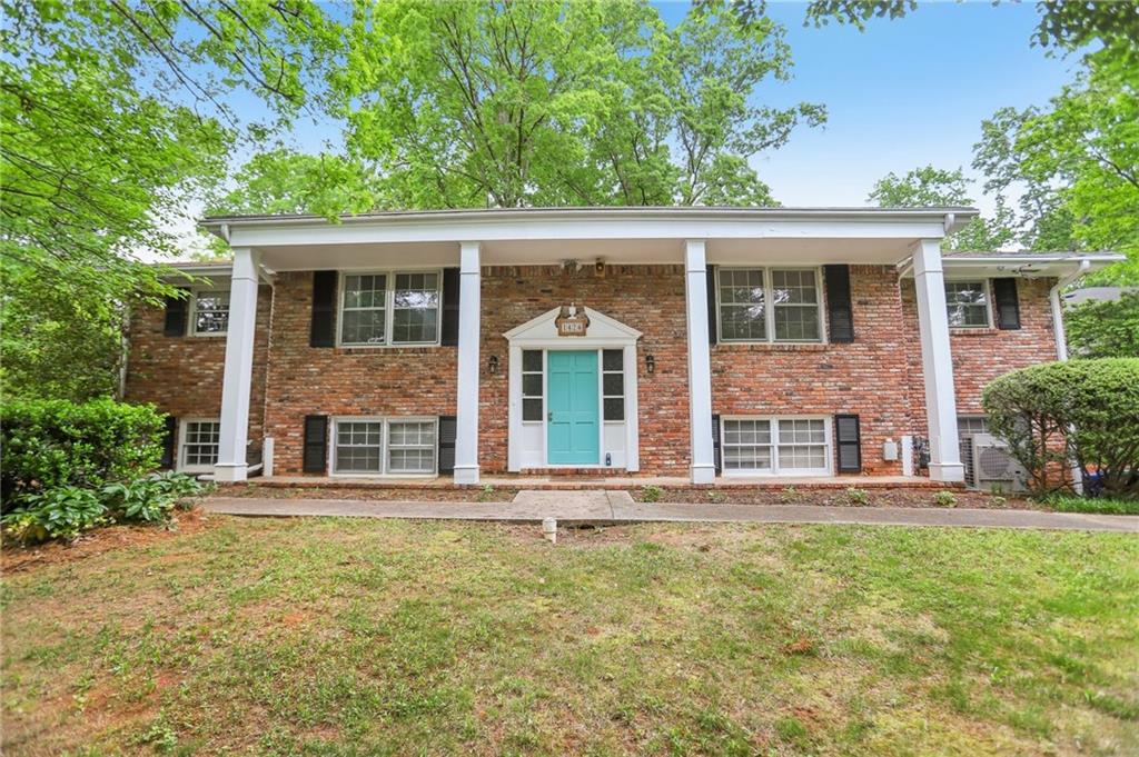 1426 Diamond Head Drive Decatur, GA 30033 - Photo 1 of 1 front view of a house with a yard