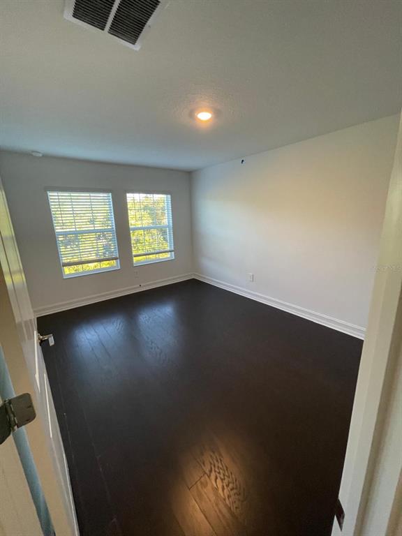 3477 Wildflower Vly Lane Wesley Chapel, FL 33543 - Photo 20 of 38 an empty room with windows