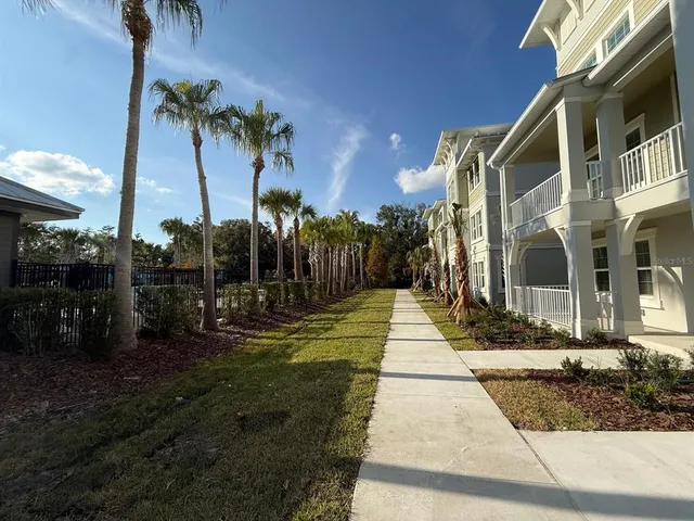 a view of a pathway with a house