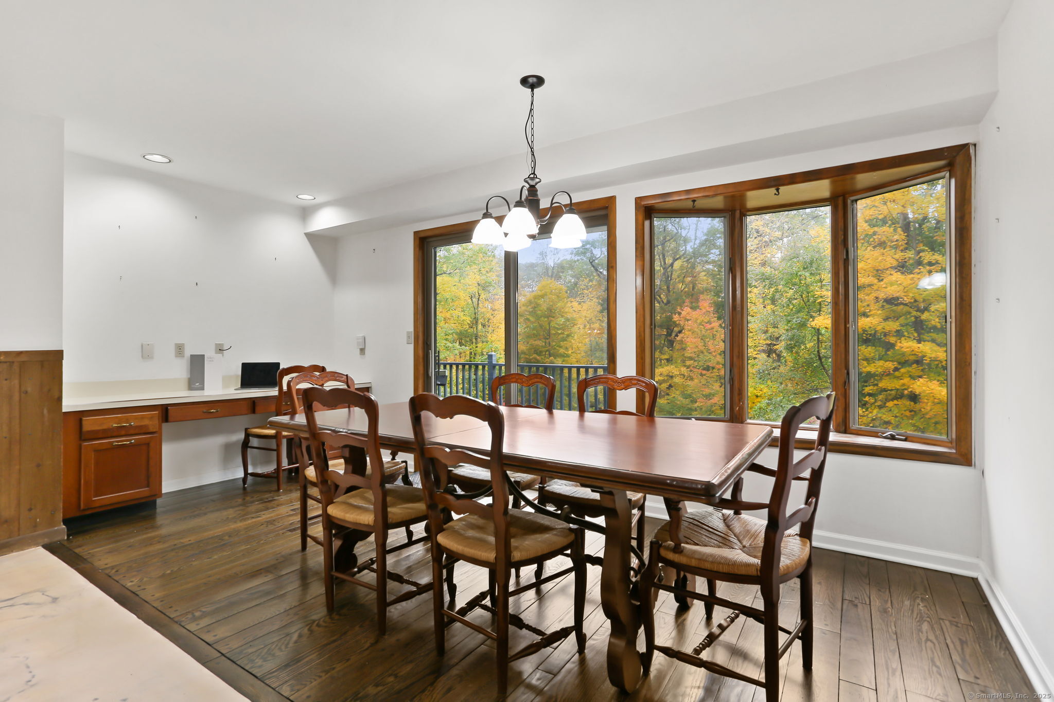 22 Ledgewood Road Redding, CT 06896 - Photo 10 of 18 a view of a dining room with furniture window and wooden floor