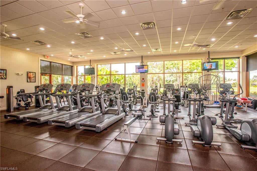 20128 Cheetah Lane Estero, FL 33928 - Photo 30 of 30 a view of a room with lots of gym equipment
