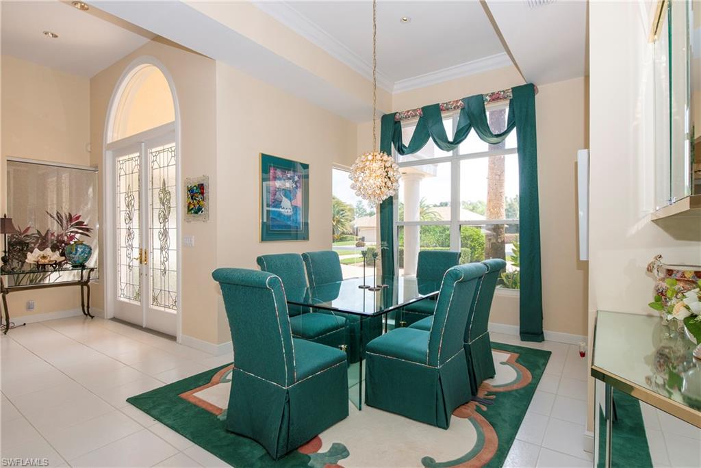 20128 Cheetah Lane Estero, FL 33928 - Photo 4 of 30 a living room with furniture and a large window