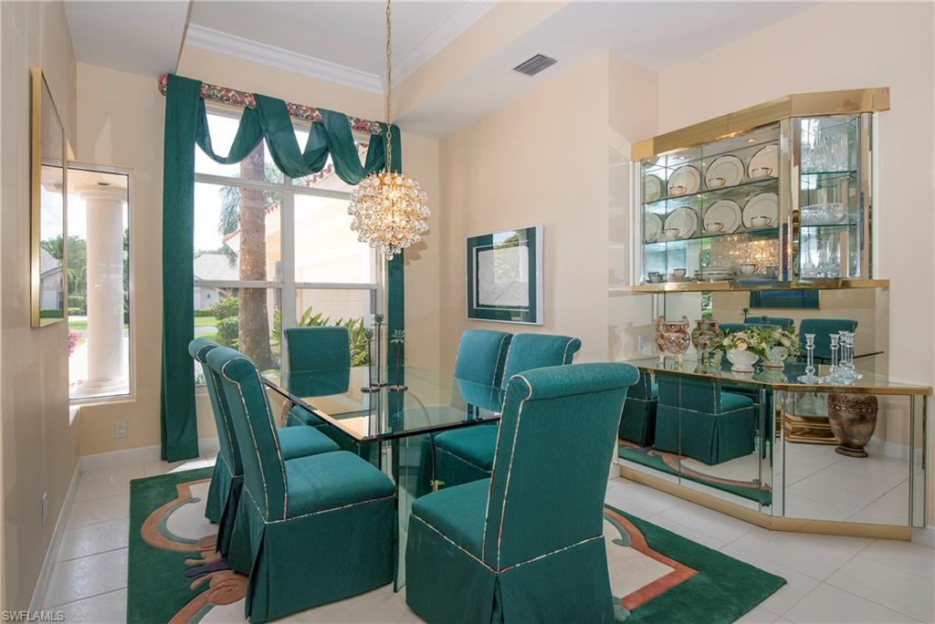 20128 Cheetah Lane Estero, FL 33928 - Photo 5 of 30 a view of a dining room with furniture window and outside view